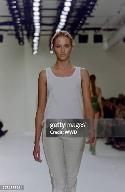 This is the first collection designed by Francisco Costa following Calvin Klein's departure from his eponymous label in the fall of 2003. Model Sara...