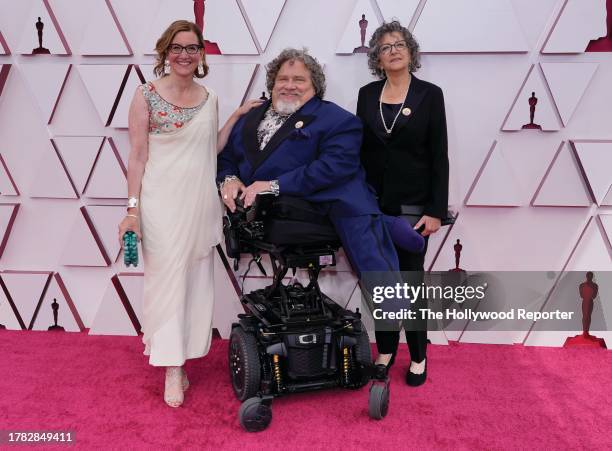 Nicole Newnham, from left, James Lebrecht, and Sara Bolder arrive at the Oscars on Sunday, April 25 at Union Station in Los Angeles.