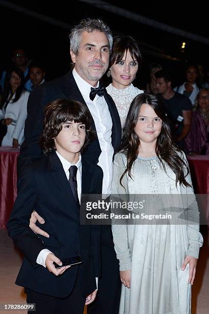 Director Alfonso Cuaron and Sheherazade Goldsmith attend the Opening Ceremony And 'Gravity' Premiere during the 70th Venice International Film...