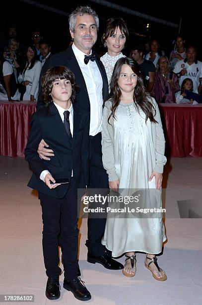 Director Alfonso Cuaron and Sheherazade Goldsmith attend the Opening Ceremony And 'Gravity' Premiere during the 70th Venice International Film...