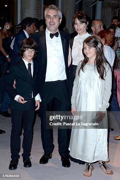 Director Alfonso Cuaron and Sheherazade Goldsmith attend the Opening Ceremony And 'Gravity' Premiere during the 70th Venice International Film...