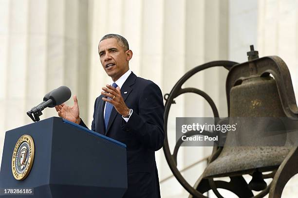 President Barack Obama delivers remarks in front of a freedom bell during the "Let Freedom Ring" commemoration event August 28, 2013 in Washington,...