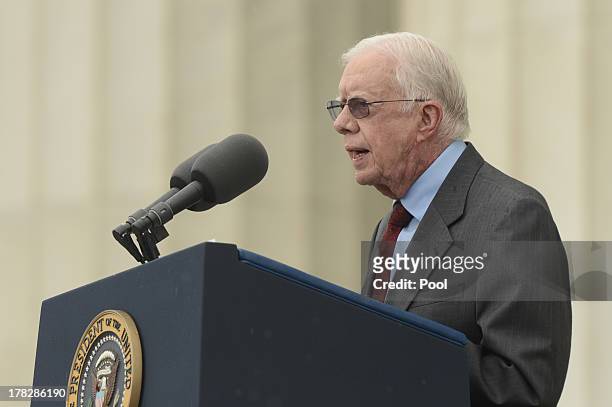 Former US President Jimmy Carter delivers remarks during the 'Let Freedom Ring' commemoration event, at the Lincoln Memorial August 28, 2013 in...
