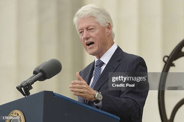 Former US President Bill Clinton delivers remarks during the 'Let Freedom Ring' commemoration event, at the Lincoln Memorial August 28, 2013 in...