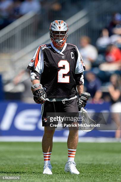 Brendan Mundorf of the Denver Outlaws in action against the Charlotte Hounds during the 2013 MLL Semifinal game at PPL Park on August 24, 2013 in...