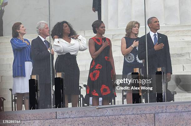 President Barack Obama, Caroline Kennedy, first lady Michelle Obama, former talk show host Oprah Winfrey, former president Bill Clinton and Lynda...