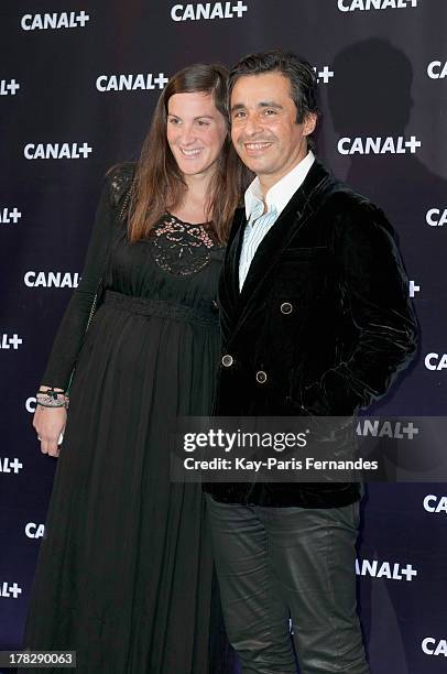 French journalist Ariel Wizman with his wife Osnath Assayag at the 'Rentree De Canal +' photocall at Porte De Versailles on August 28, 2013 in Paris,...