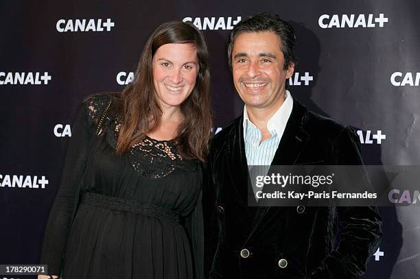 French journalist Ariel Wizman with his wife Osnath Assayag at the 'Rentree De Canal +' photocall at Porte De Versailles on August 28, 2013 in Paris,...