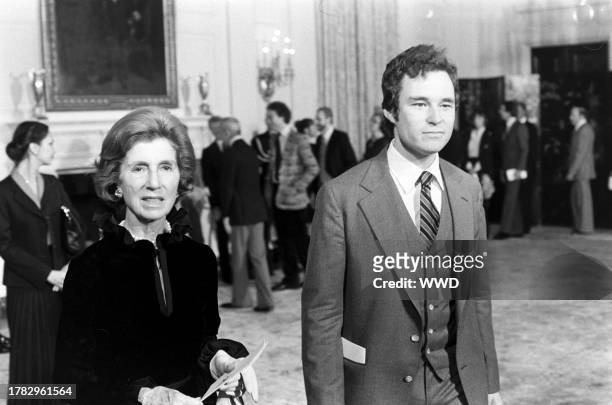 Janet Auchincloss and Jamie Auchincloss attend a reception, following a ballet performance by Mikhail Baryshnikov, at the White House in Washington,...