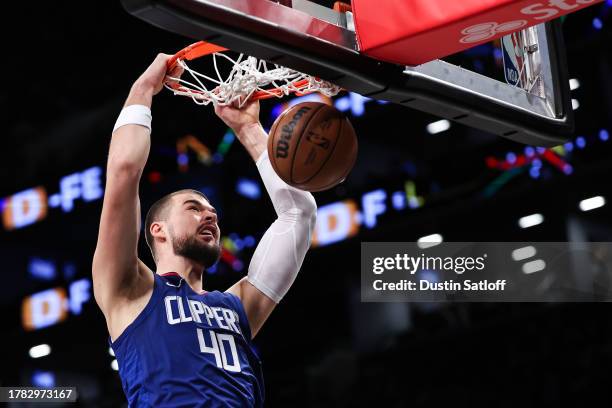 Ivica Zubac of the Los Angeles Clippers dunks the ball during the first quarter of the game against the Brooklyn Nets at Barclays Center on November...