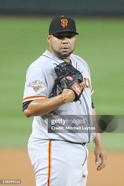 Jose Mijares of the San Francisco Giants pitches during the game against the Washington Nationals on August 13, 2013 at Nationals Park in Washington,...