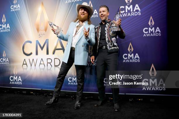 John Osborne and T.J. Osborne of The Brothers Osborne pose withthe Vocal Duo of the Year award in the pressroom of the 57th Annual CMA Awards at...