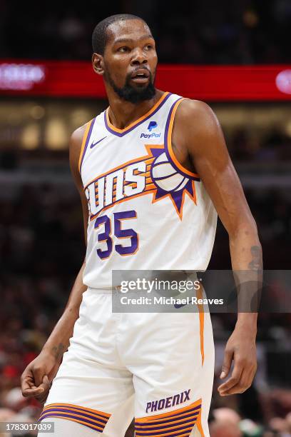 Kevin Durant of the Phoenix Suns reacts against the Chicago Bulls during the first half at the United Center on November 08, 2023 in Chicago,...