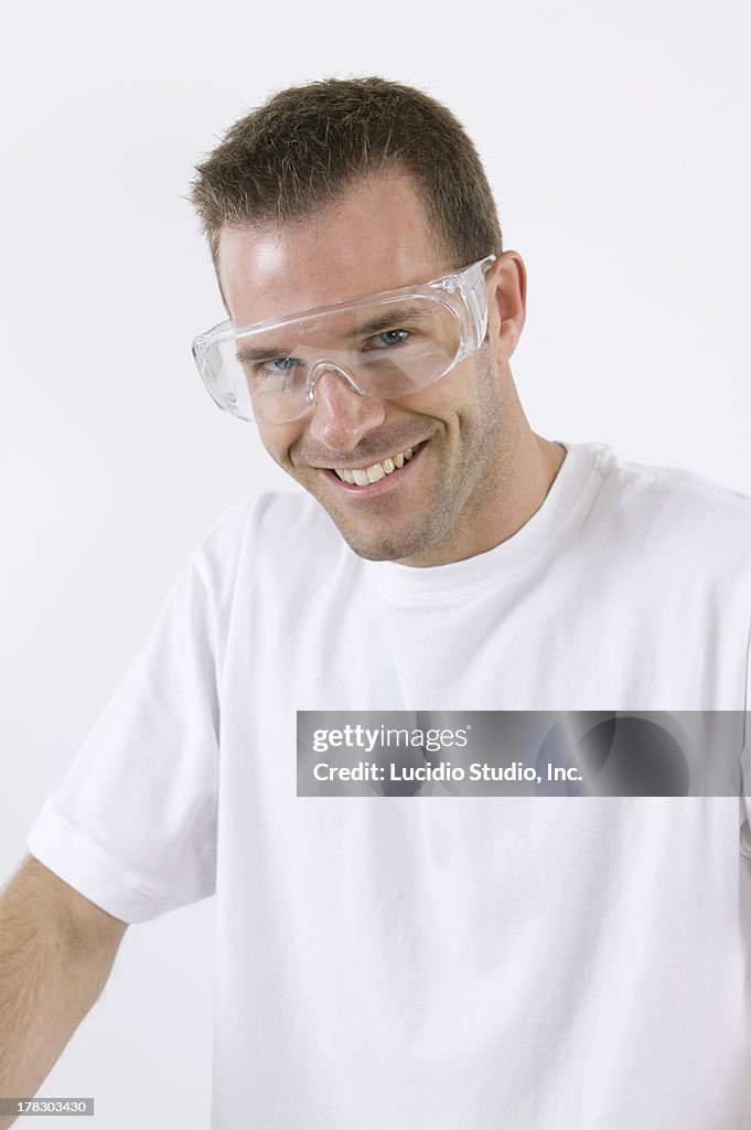 DIY man wearing eye protection