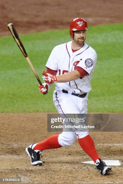 Chad Tracy of the Washington Nationals takes a swing during the game against the San Francisco Giants on August 13, 2013 at Nationals Park in...
