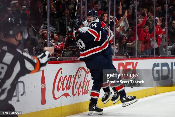 Anthony Mantha of the Washington Capitals celebrates with Connor McMichael after scoring goal against the Florida Panthers during the second period...