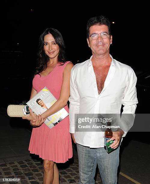 Lauren Silverman and Simon Cowell sighting in Kensington on August 28, 2013 in London, England.