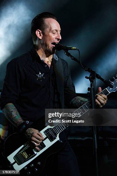 Michael Poulsen of Volbeat performs during the Rock Allegiance Tour at Freedom Hill Amphitheater on August 28, 2013 in Sterling Heights, Michigan.