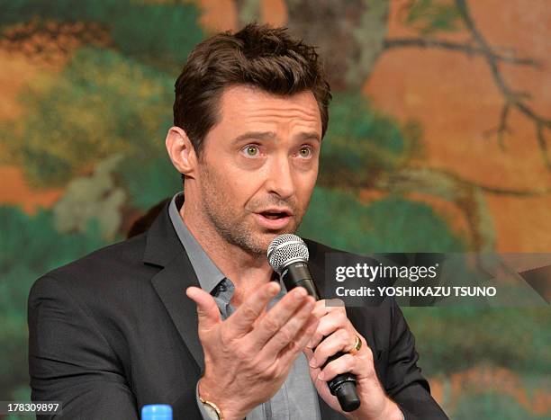 Australian actor Hugh Jackman speaks as he attends a press conference for his latest move "The Wolverine" in Tokyo on August 29, 2013. The action...