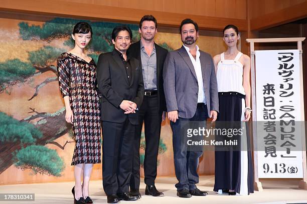 Actress Rila Fukushima, actors Hiroyuki Sanada, Hugh Jackman, director James Mangold and actress Tao pose for photos during the 'The Wolverine' press...