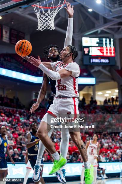 Pop Isaacs of the Texas Tech Red Raiders lays the ball up during the second half of the game against the Texas A&M-Commerce Lions at United...