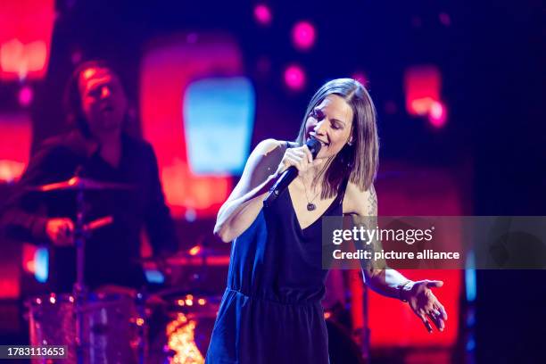 November 2023, Baden-Württemberg, Offenburg: Christina Stürmer performs on stage during the recording of "Die große Silvester Show". The Eurovision...