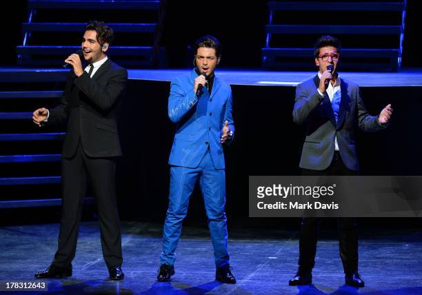 Italian operatic pop singers Piero Barone, Gianluca Ginoble and Ignazio Boschetto of Il Volo perform at Gibson Amphitheatre on August 28, 2013 in...