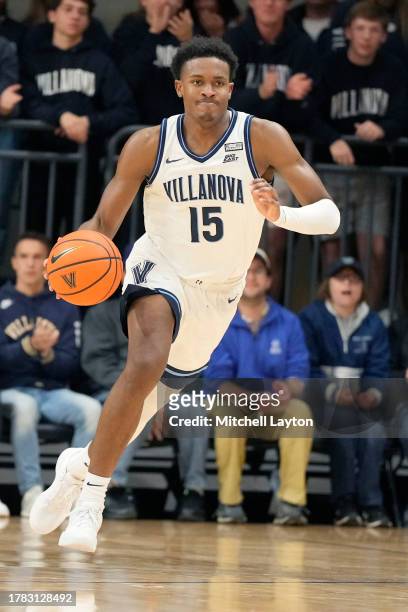 Jordan Longino of the Villanova Wildcats dribbles up court during a college basketball game against the American University Eagles at Finnegan...