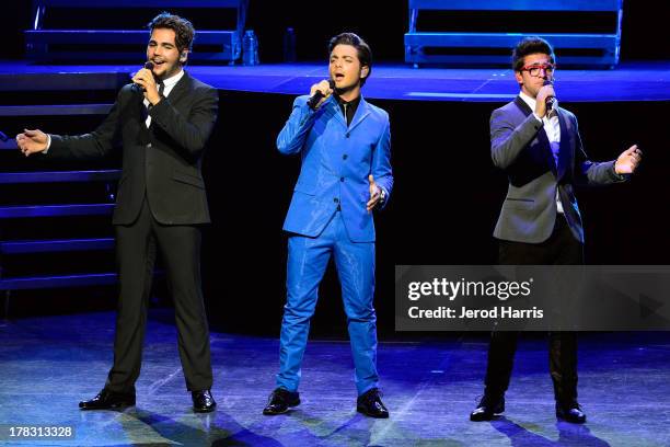 Ignazio Boschetto, Gianluca Ginoble and Piero Barone of Il Volo perform at Gibson Amphitheatre on August 28, 2013 in Universal City, California.