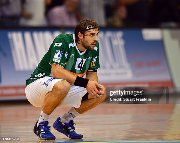 Tim Kneule of Goeppingen looks dejected during the DKB Bundesliga game between SG Flensburg Handewitt and Frisch Auf Goeppingen at the Flens arena on...