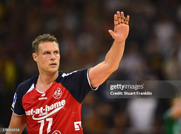 Michael Knudsen of Flensburg gestues during th DKB Bundesliga game between SG Flensburg Handewitt and Frisch Auf Goeppingen at the Flens arena on...