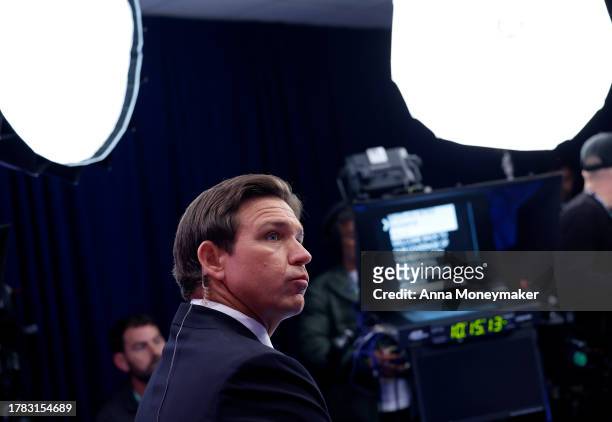 Republican presidential candidate Florida Gov. Ron DeSantis speaks to reporters in the spin room following the NBC News Republican Presidential...