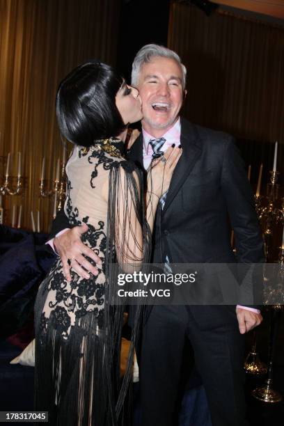Actress Christy Chung and director Baz Luhrmann attend "The Great Gatsby" premiere at China World Trade Center Tower 3 on August 28, 2013 in Beijing,...