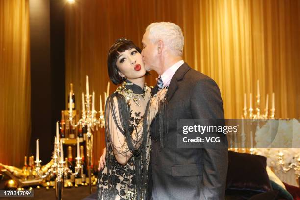 Director Baz Luhrmann and actress Christy Chung attend "The Great Gatsby" premiere at China World Trade Center Tower 3 on August 28, 2013 in Beijing,...