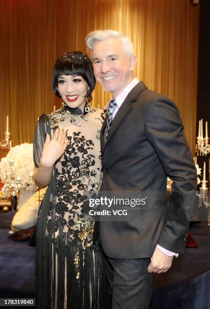 Director Baz Luhrmann and actress Christy Chung attend "The Great Gatsby" premiere at China World Trade Center Tower 3 on August 28, 2013 in Beijing,...