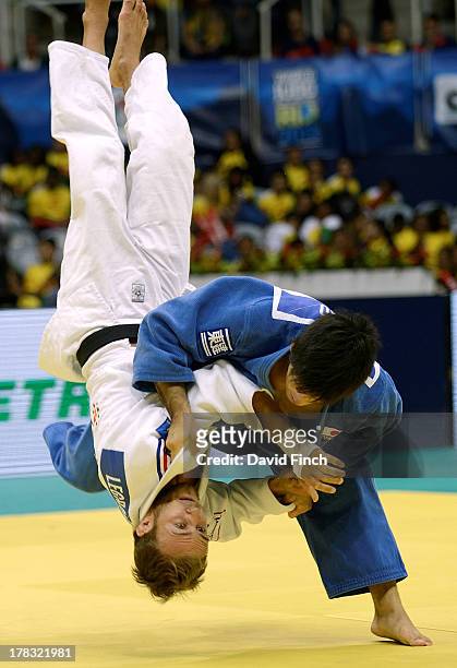 Shohei Ono of Japan throws Ugo Legrand of France for ippon to win the u73kgs gold medal on day 3 of the Rio World Judo Championships, on August 28,...