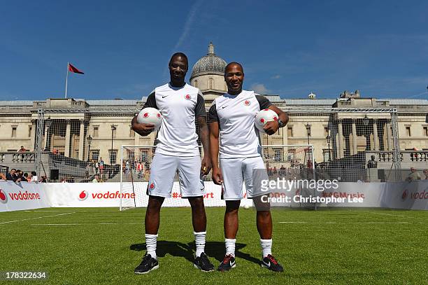 Ex Tottenham Hotspur Legends Ledley King and Les Ferdinand pose for the camera during the Vodafone 4G Goes Live Launch at Trafalgar Sq on August 29,...
