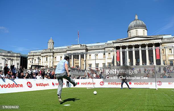 Member of the public takes a penalty kick during the Vodafone 4G Goes Live Launch at Trafalgar Sq on August 29, 2013 in London, England. Vodafone...