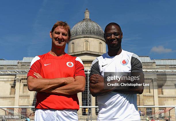 Ex Arsenal Legend Tony Adams with Ex Tottenham Hotspur Legend Ledley King pose for the camera during the Vodafone 4G Goes Live Launch at Trafalgar Sq...