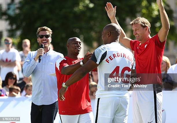 Presenter Rick Edwards, Ex Arsenal legends Ian Wright, Tony Adams and Ex Tottenham Hostspur legend Les Ferdinand during the Vodafone 4G Goes Live...