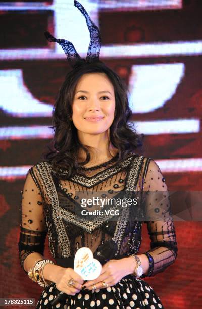 Chinese actress Zhang Ziyi poses as she attends "My Lucky Star" press conference on August 29, 2013 in Beijing, China.