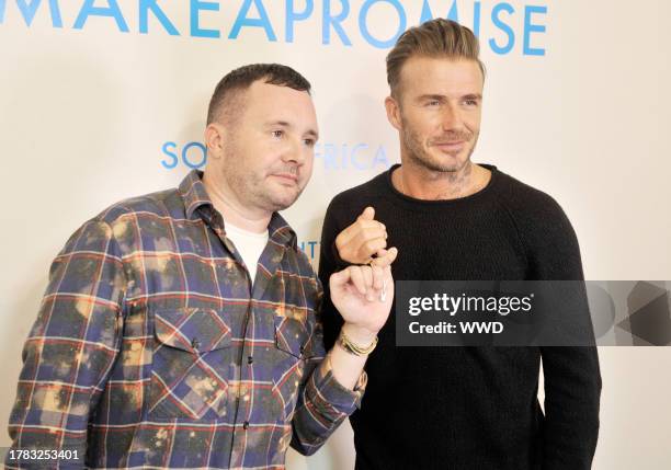 Kim Jones and David Beckham backstage