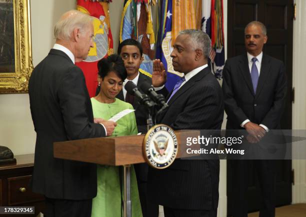 Todd Jones is sworn in by U.S. Vice President Joseph Biden as the Director of the Bureau of Alcohol, Tobacco, and Firearms as Jones' wife Margret...