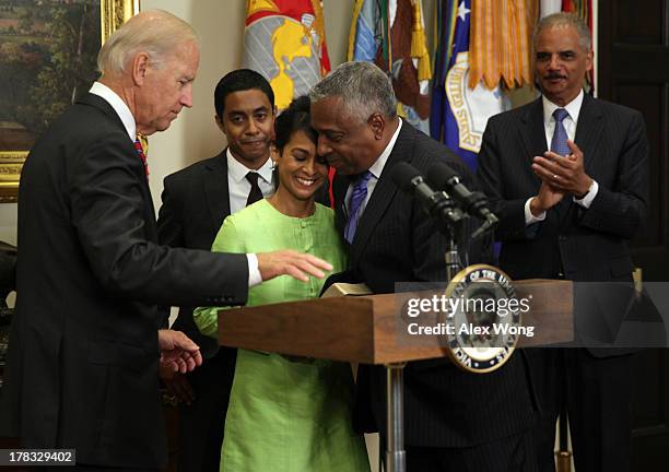 Todd Jones shares a moment with his wife Margret Jones after he was sworn in by U.S. Vice President Joseph Biden as the Director of the Bureau of...