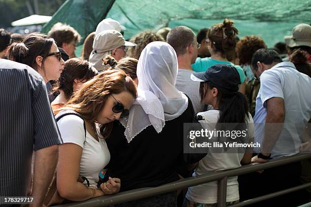 Israeli citizens gather in the city of Haifa to change and pick up gas masks as tension surrounding the Syrian crisis escalates on August 29, 2013 in...