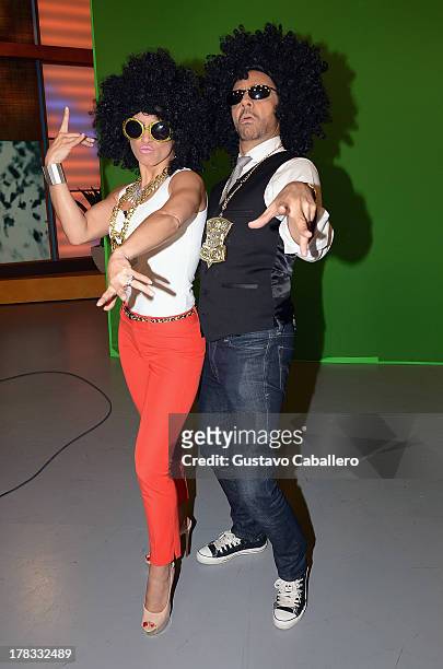 Alessandra Rosaldo and Eugenio Derbez make an appearance to promote the film 'Instructions Not Included' at Univision Headquarters on August 29, 2013...