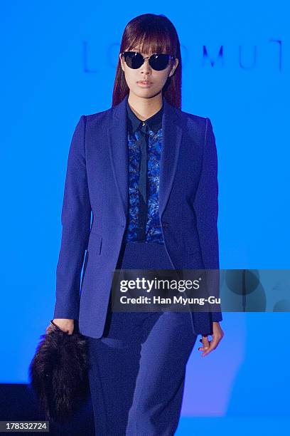 Model walks the runway at the "Loudmut" launching fashion show at the JNB gallery on August 29, 2013 in Seoul, South Korea.