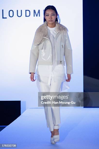 Model walks the runway at the "Loudmut" launching fashion show at the JNB gallery on August 29, 2013 in Seoul, South Korea.