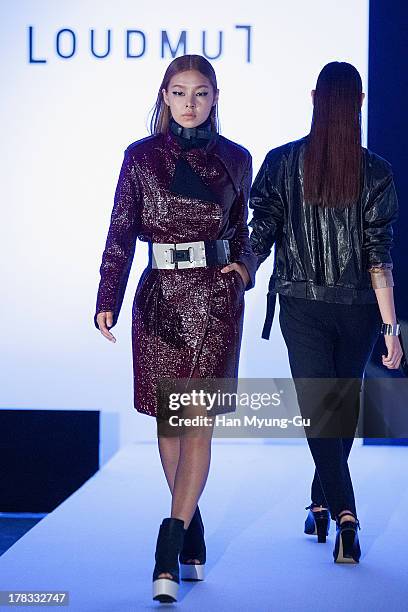 Model walks the runway at the "Loudmut" launching fashion show at the JNB gallery on August 29, 2013 in Seoul, South Korea.