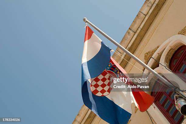 croatia, sibenik, croatian flag - sibenik croatia stock pictures, royalty-free photos & images